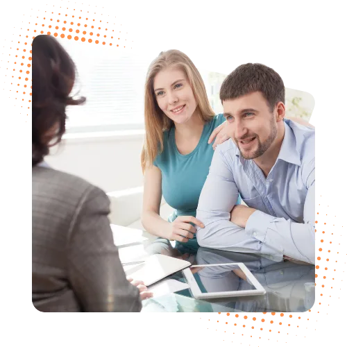 HP Energy | Federal Battery Rebate 2025 – Save 30% on Battery Systems Couple meeting with an energy consultant to learn about their eligibility for the Federal Battery Rebate 2025